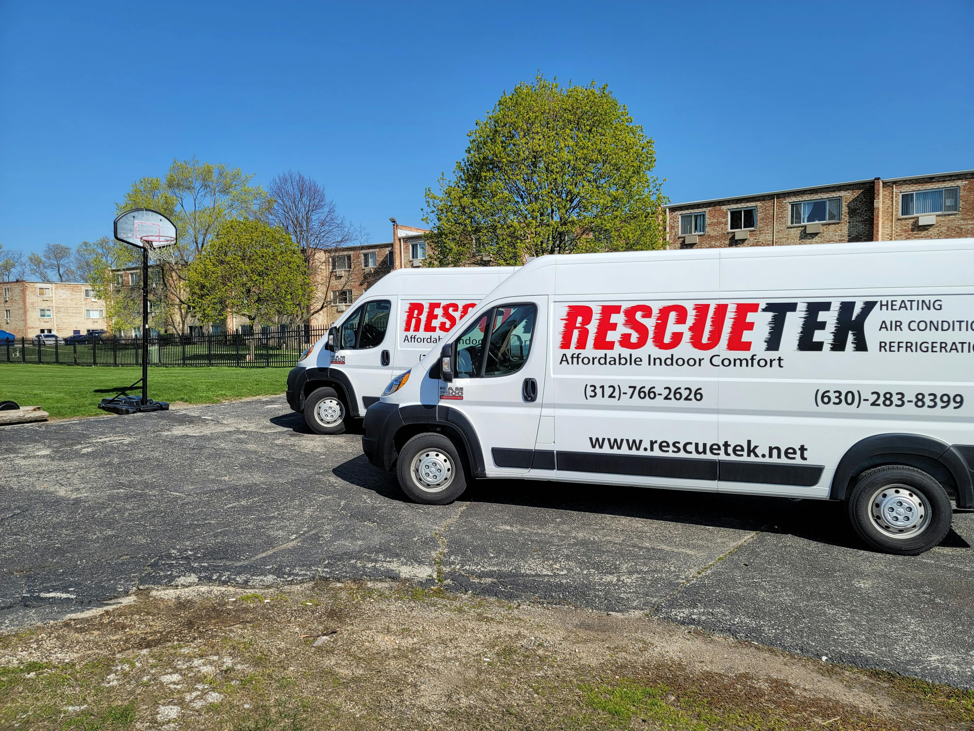 Image of Rescuetek Heating & AC service vans